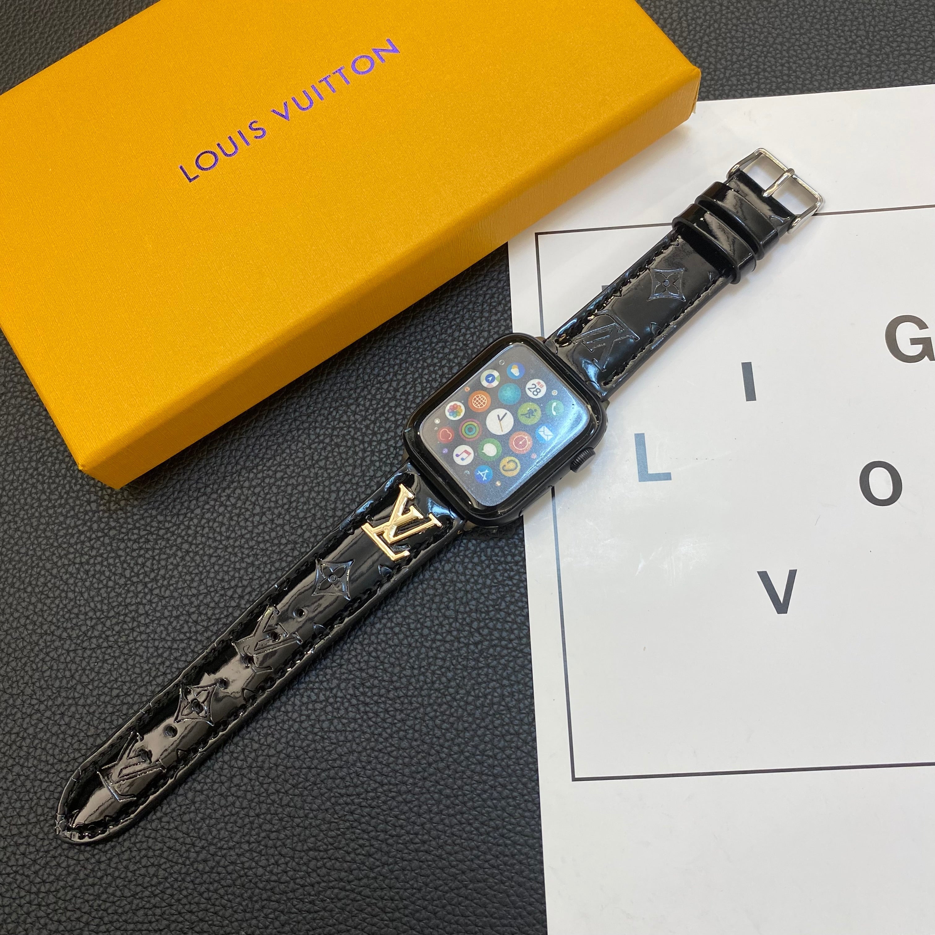 GLOSSY LEATHER APPLE WATCH STRAP LUXURY METAL LOGO